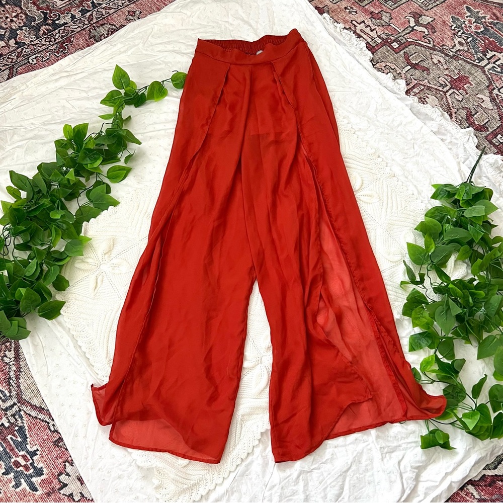 Super cute orange flowy split leg pants from Charlotte Russe